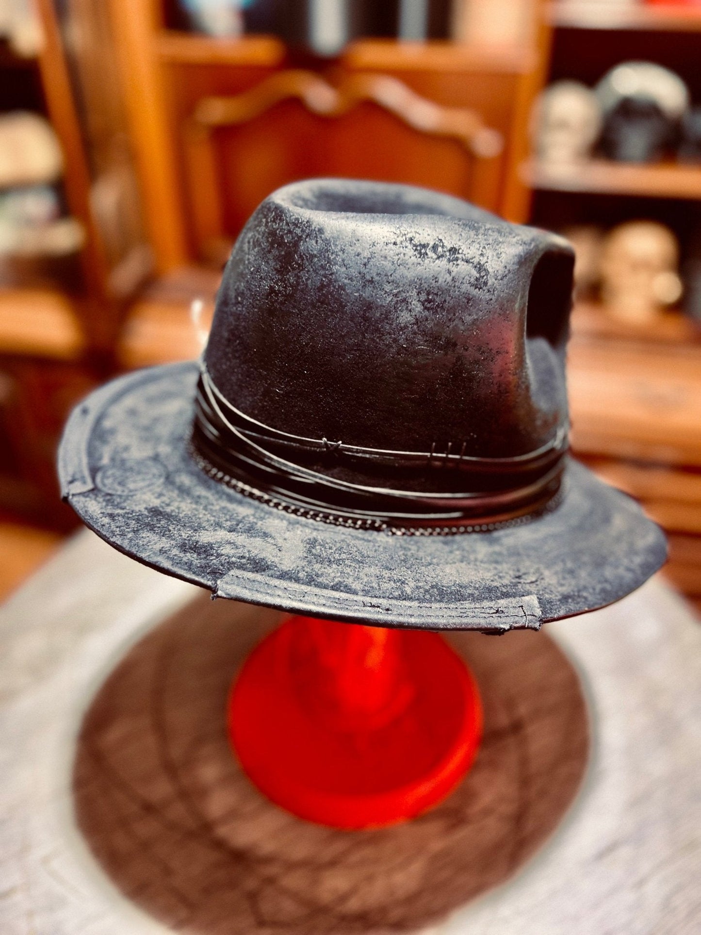 Authentic handcrafted vintage hat in distressed black leather with decorative band by JonHats