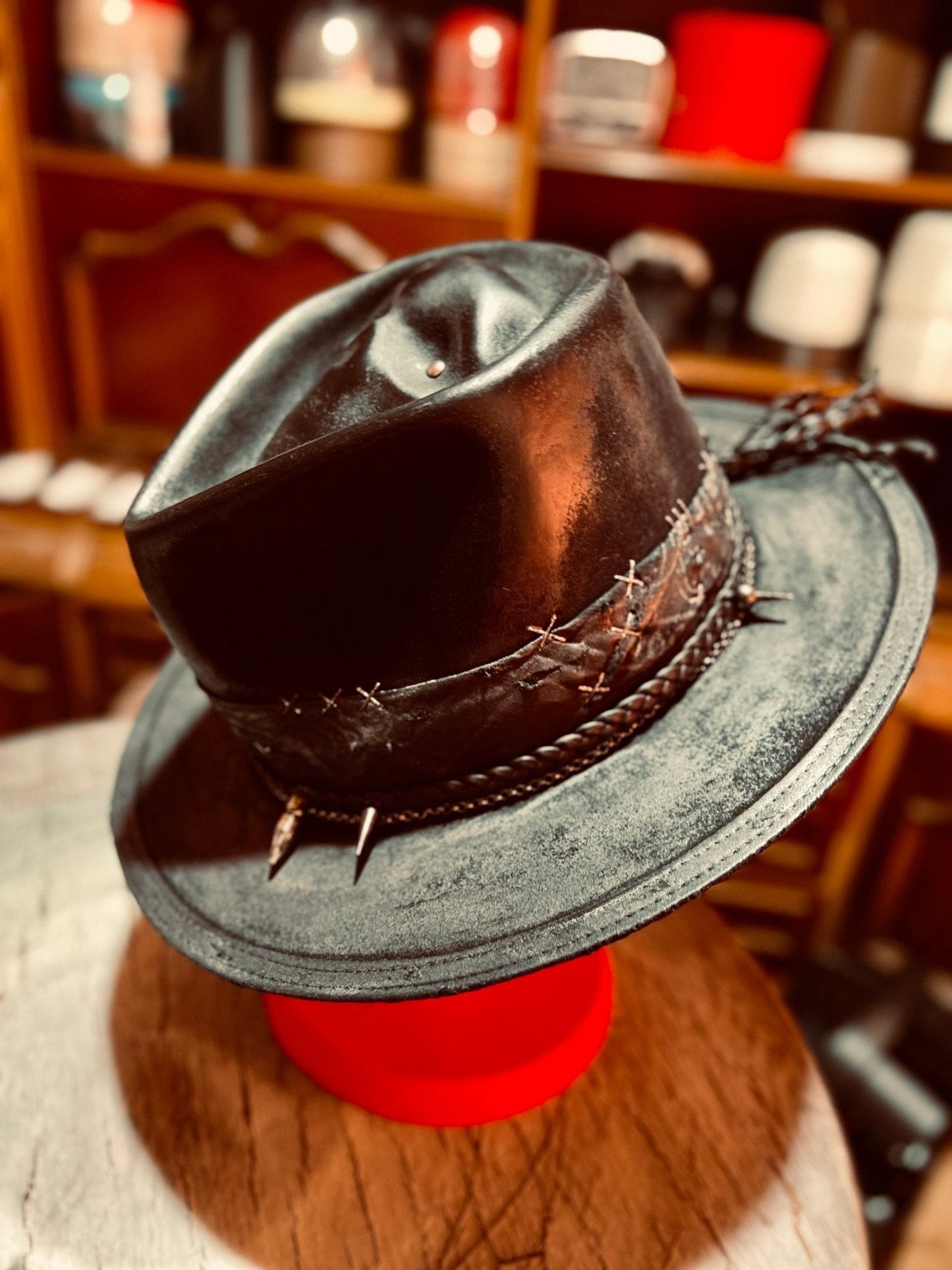 Handcrafted vintage gothic hat in black leather with barbed wire and spike detailing by JonHats