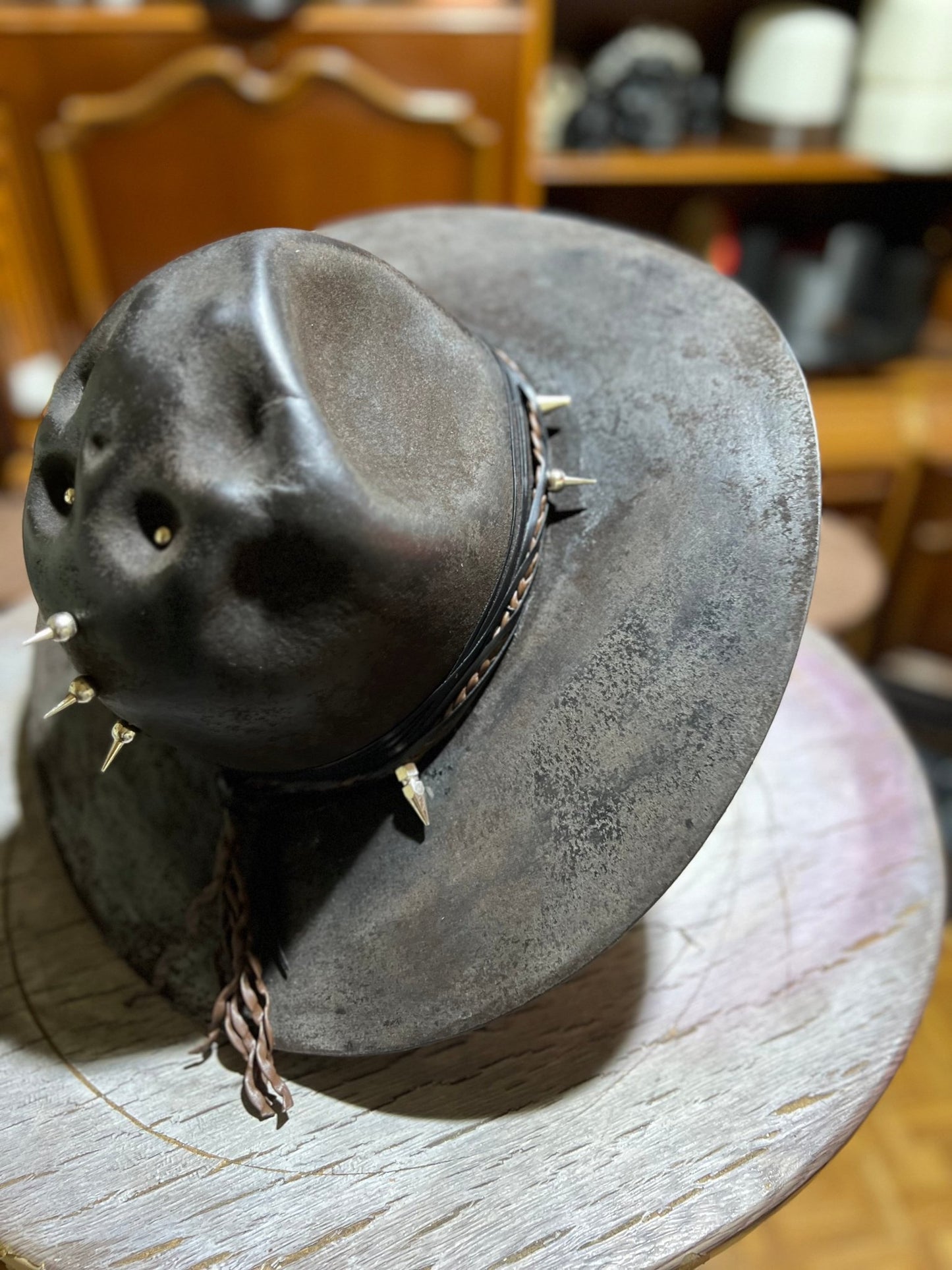 Handmade punk apocalyptic hat by JonHats featuring distressed leather and metal spikes