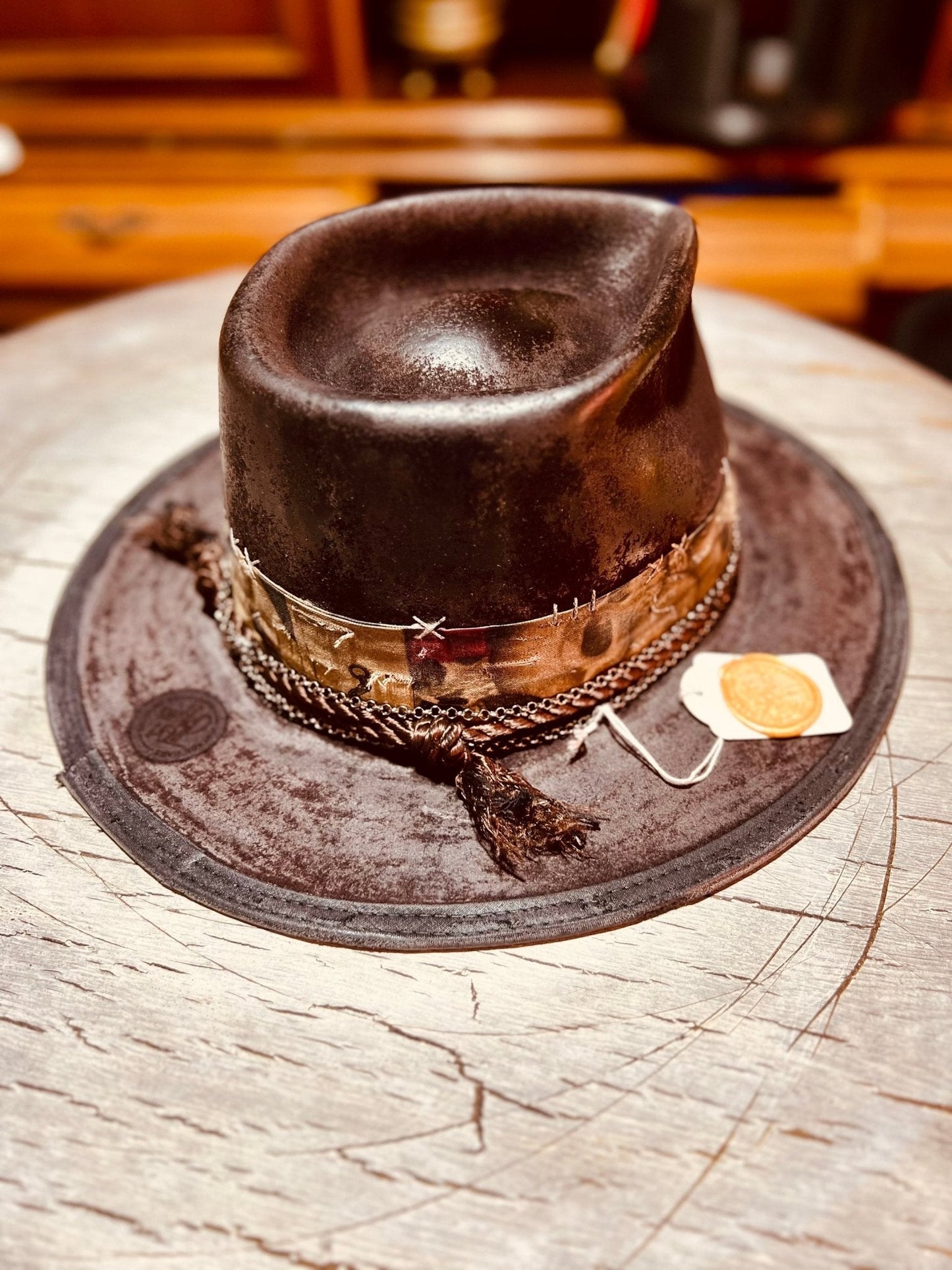 Handmade vintage distressed hat in dark brown with decorative band and chain detailing by JonHats