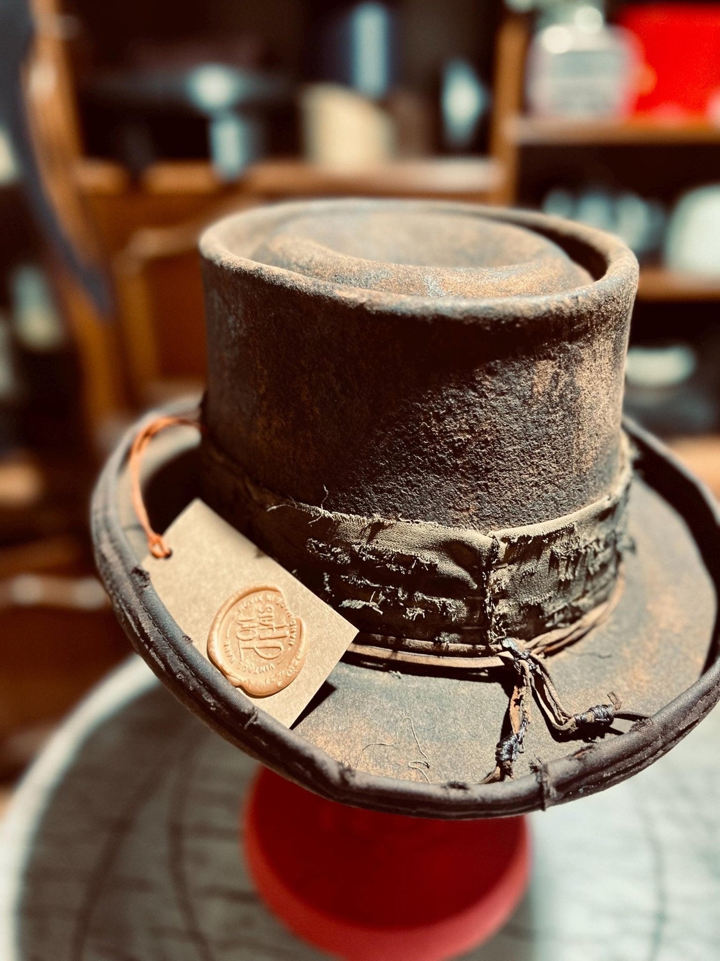 JonHats handmade western hat with rugged leather finish and detailed band design