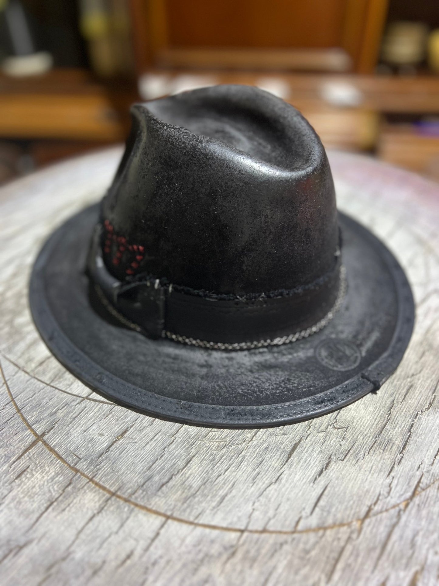 JonHats black leather Las Vegas style vintage hat with stitched band and worn texture