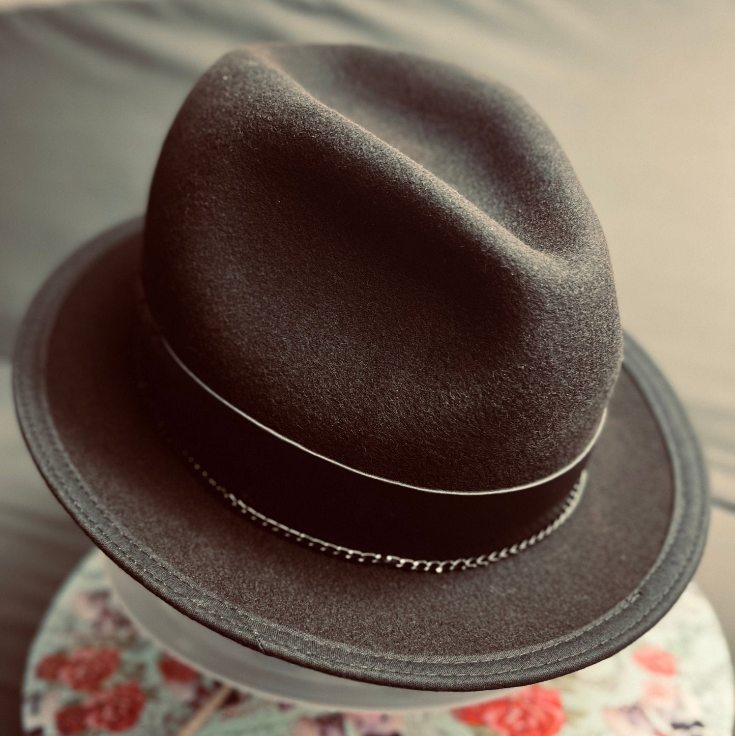 Luxury men's classic fedora in dark brown with a black band and decorative trim by JonHats