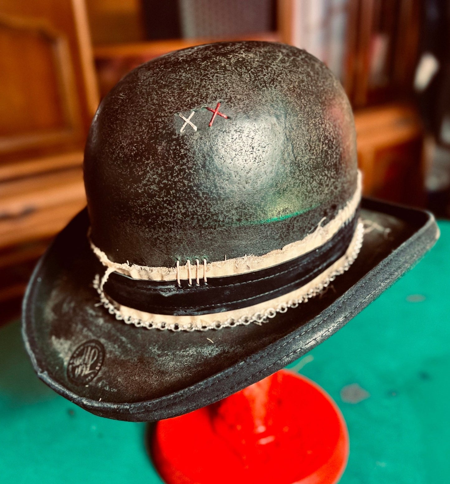 Unique handcrafted vintage hat with distressed black leather and decorative stitching by JonHats