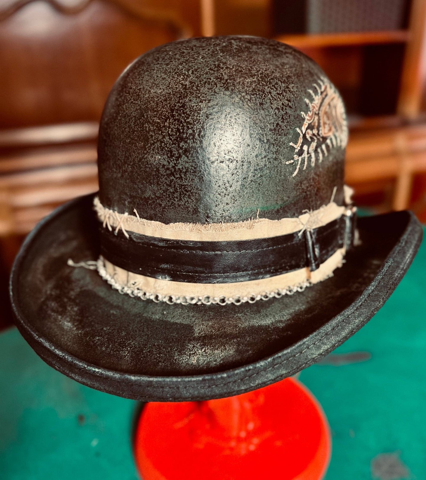 Unique handcrafted vintage hat in black with distressed finish and decorative band by JonHats