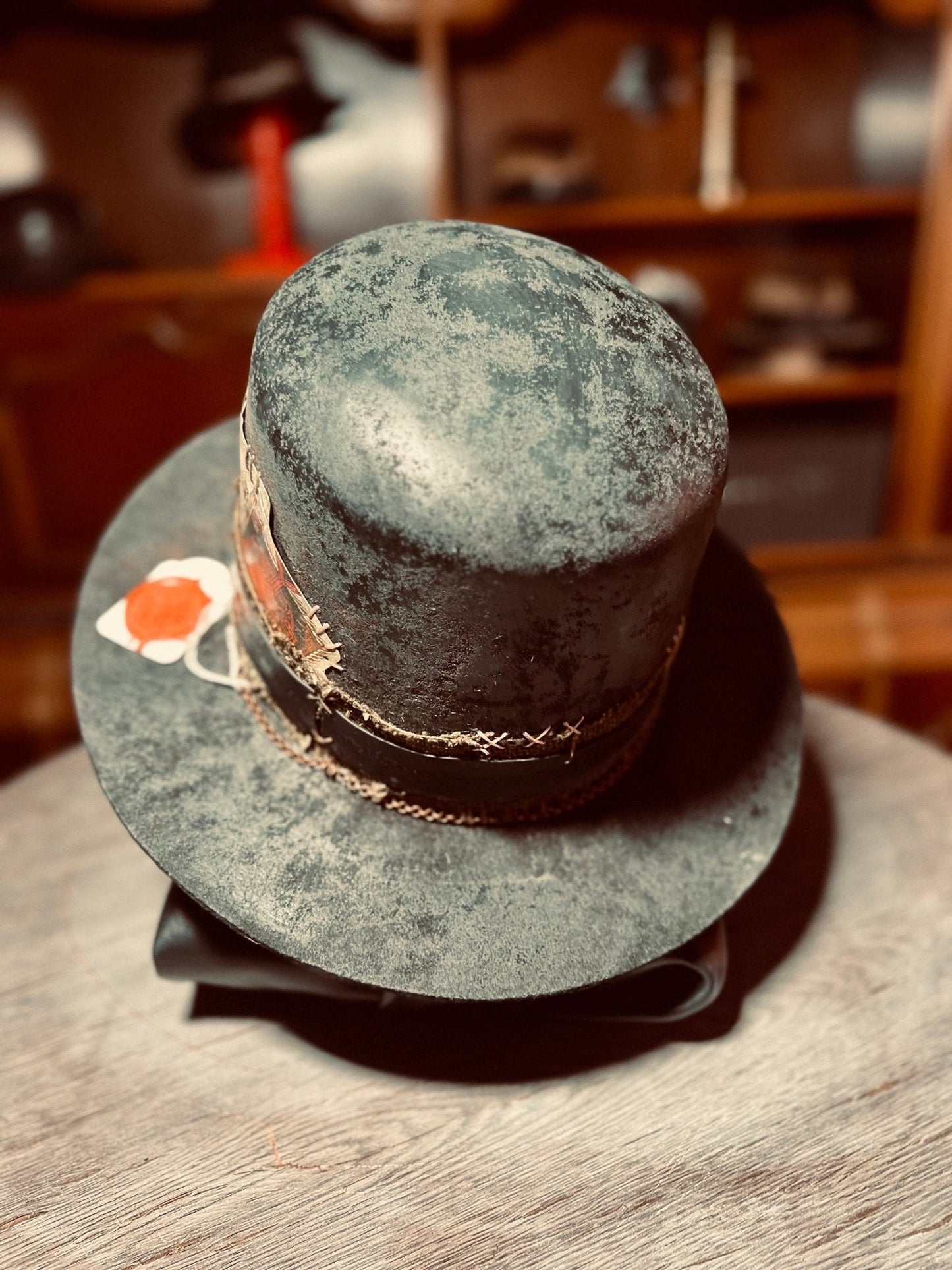 Vintage western open crown hat by JonHats with distressed finish and decorative stitched band