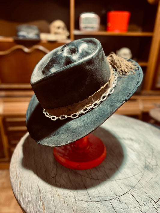 JonHats vintage men's artisan hat in dark leather with chain detailing and rustic design