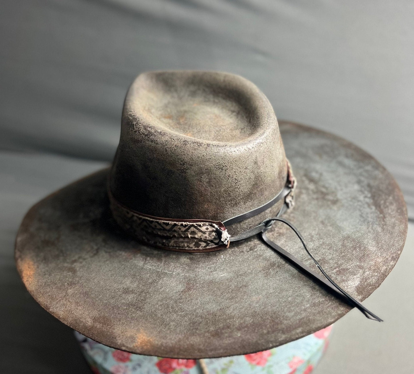 Exclusive handcrafted hats by JonHats featuring a wide brim and textured design in vintage brown