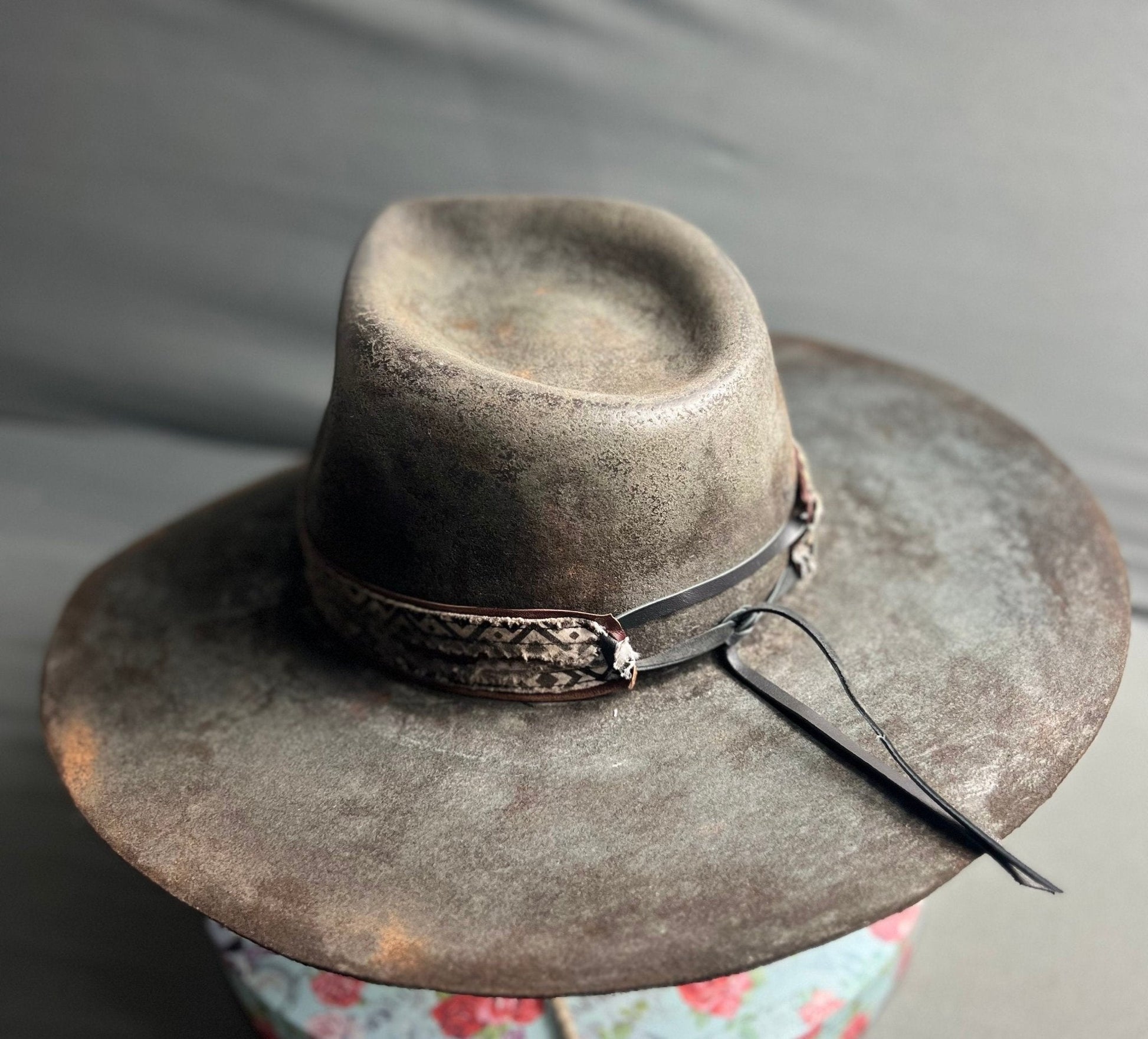 Exclusive handcrafted hats by JonHats featuring a wide brim and textured design in vintage brown