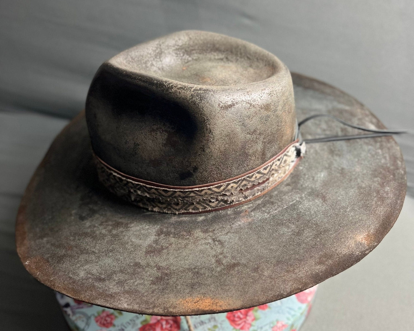 JonHats exclusive handcrafted hats featuring a vintage brown wide-brimmed design with decorative band