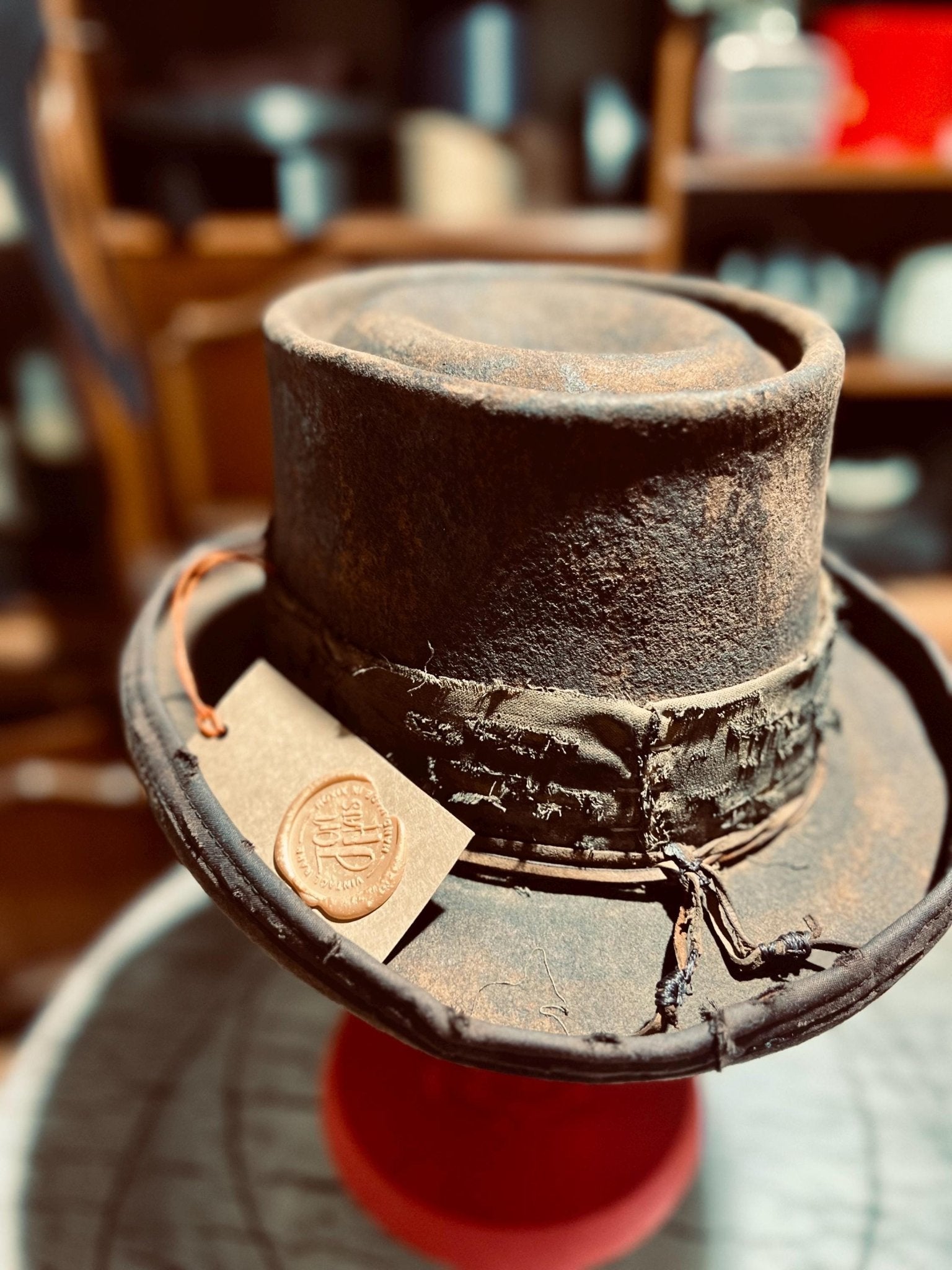 JonHats handmade western hat with rugged leather finish and detailed band design