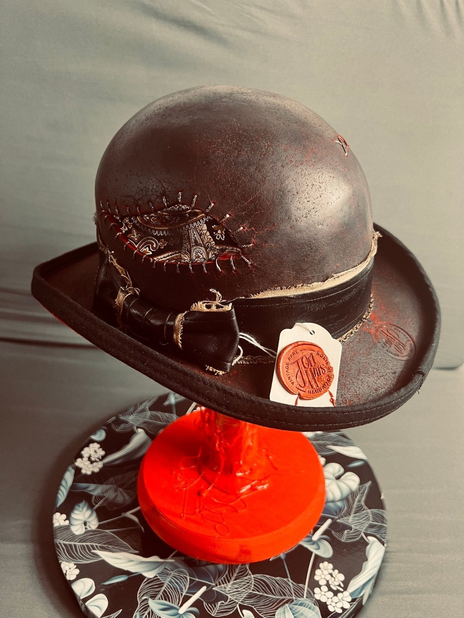 Luxury bespoke vintage fedora by JonHats in distressed brown leather with stitched detailing and decorative band